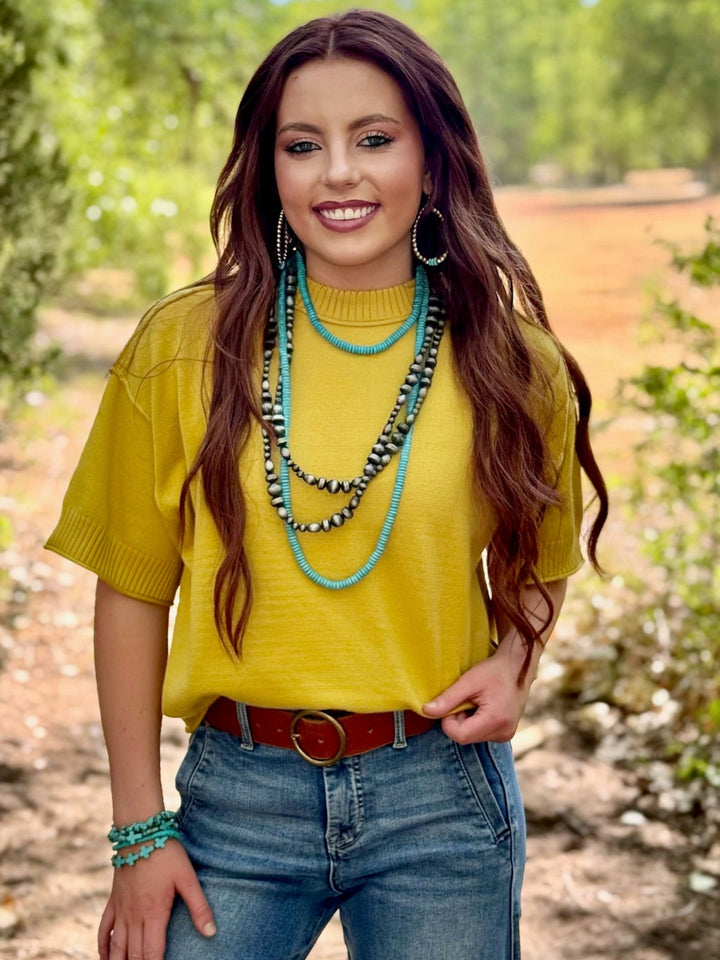 Clara Exposed Hem Top