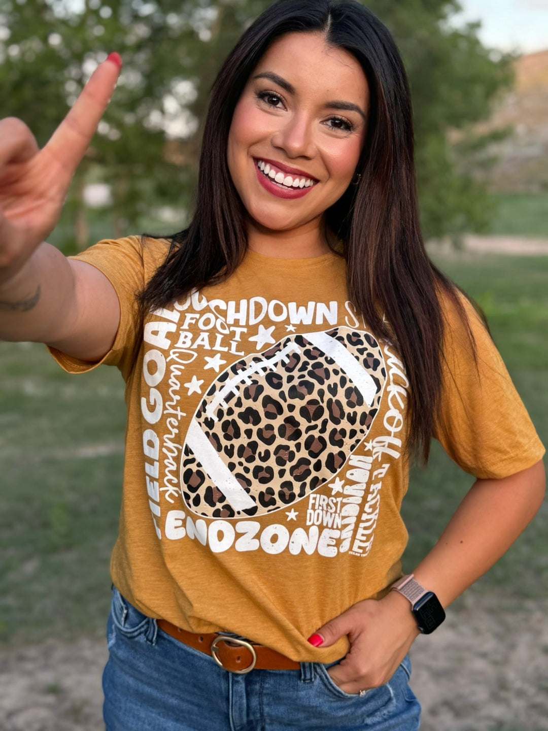Leopard Football with Scattered Words Tee by Texas True Threads
