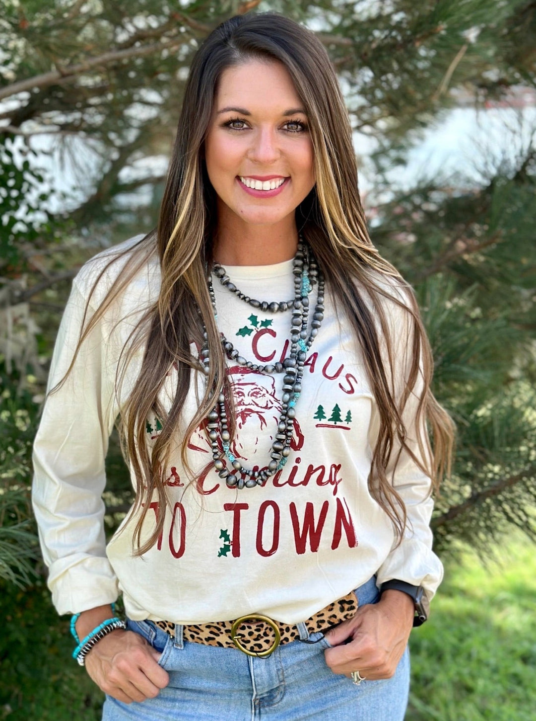 Santa Claus is Coming to Town Cream Long Sleeve Graphic Tee by Texas True Threads