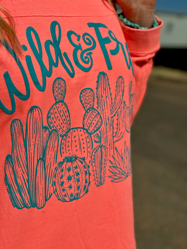Wild & Free Cactus Scene Coral Long Sleeve Graphic Tee by Texas True Threads
