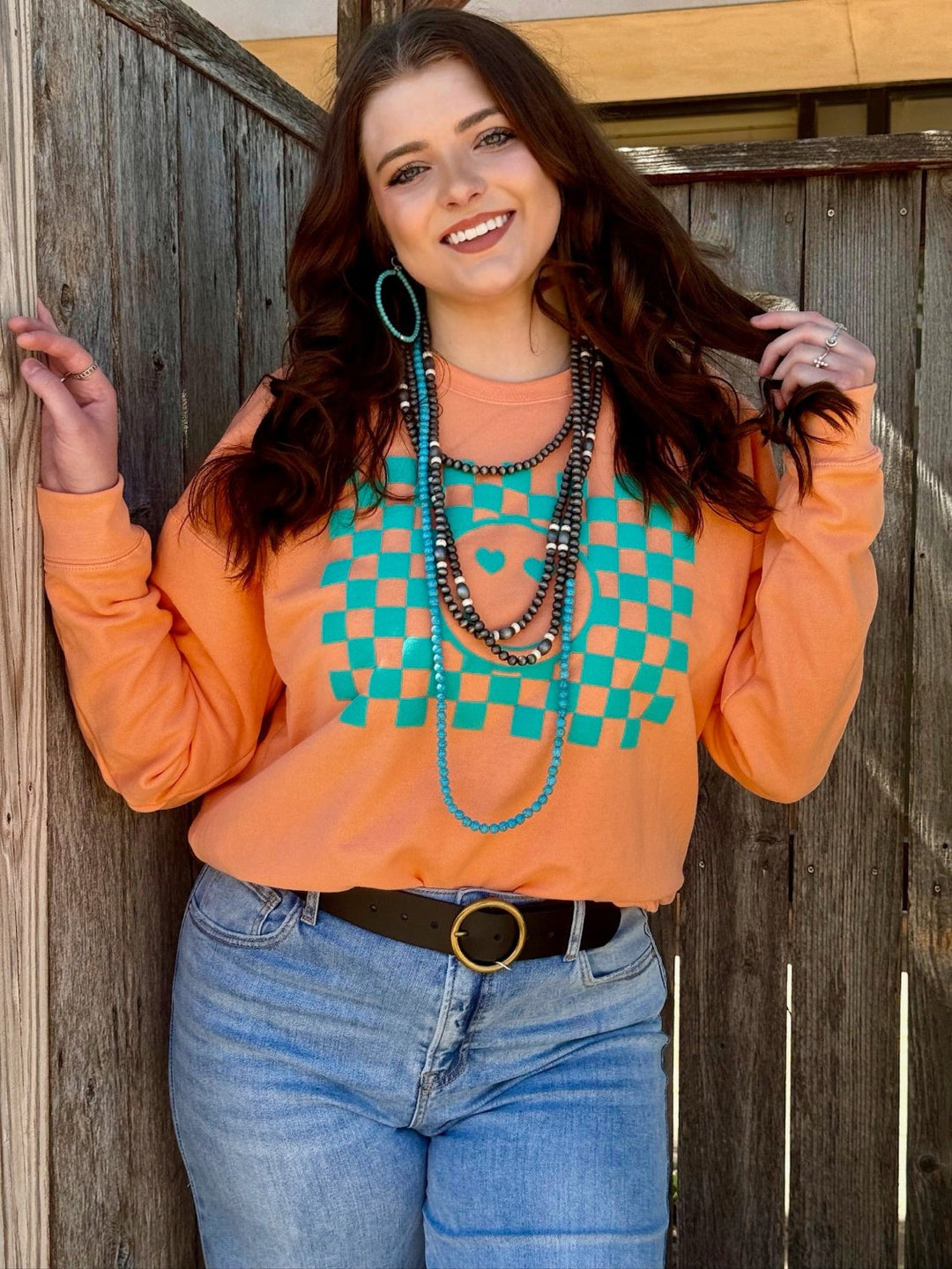 Smiley Face in Turquoise Puff Ink Sweatshirt by Texas True Threads