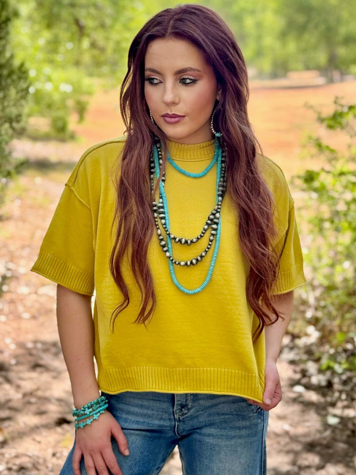 Clara Exposed Hem Top