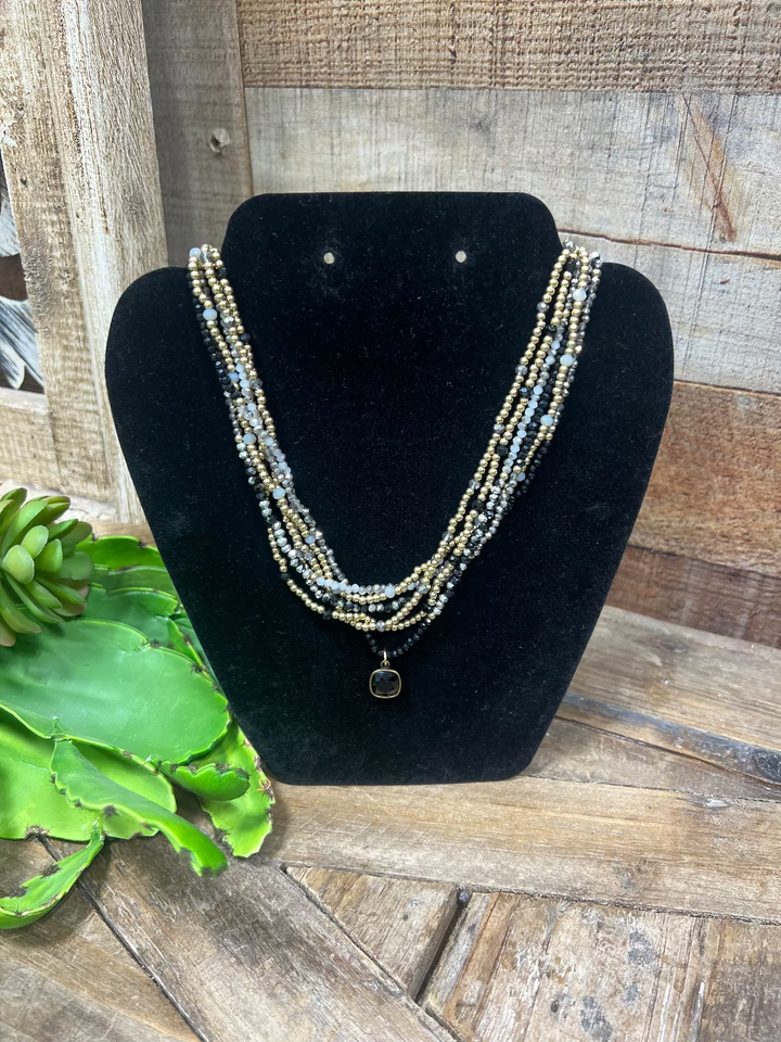 Azel 6 Strand Gold & Black Necklace