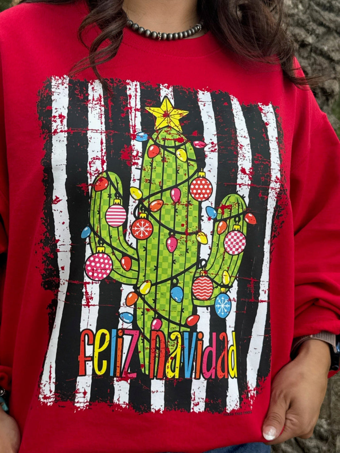 Feliz Navidad Graphic Tee by Texas True Threads