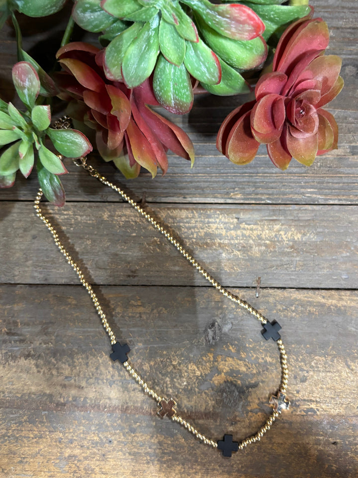 Sealy Black & Gold Cross Necklace